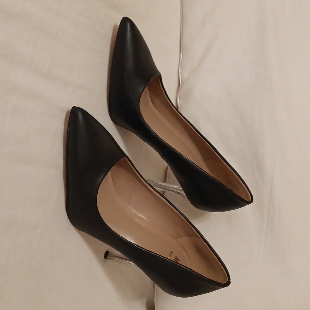 Sexy clear heel black pumps